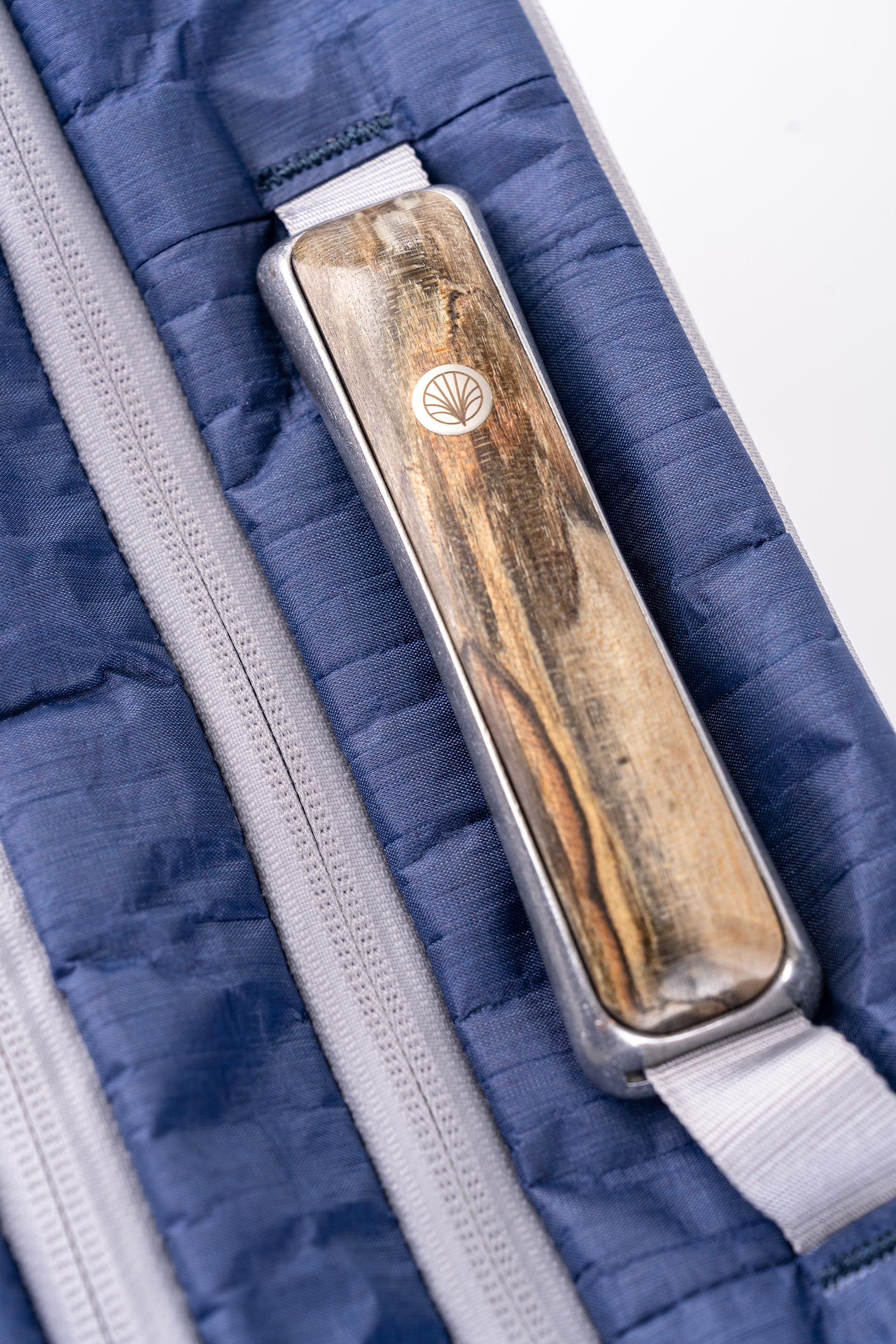 Offsite signature handle, Contoured aluminum with hand-milled wood inlay