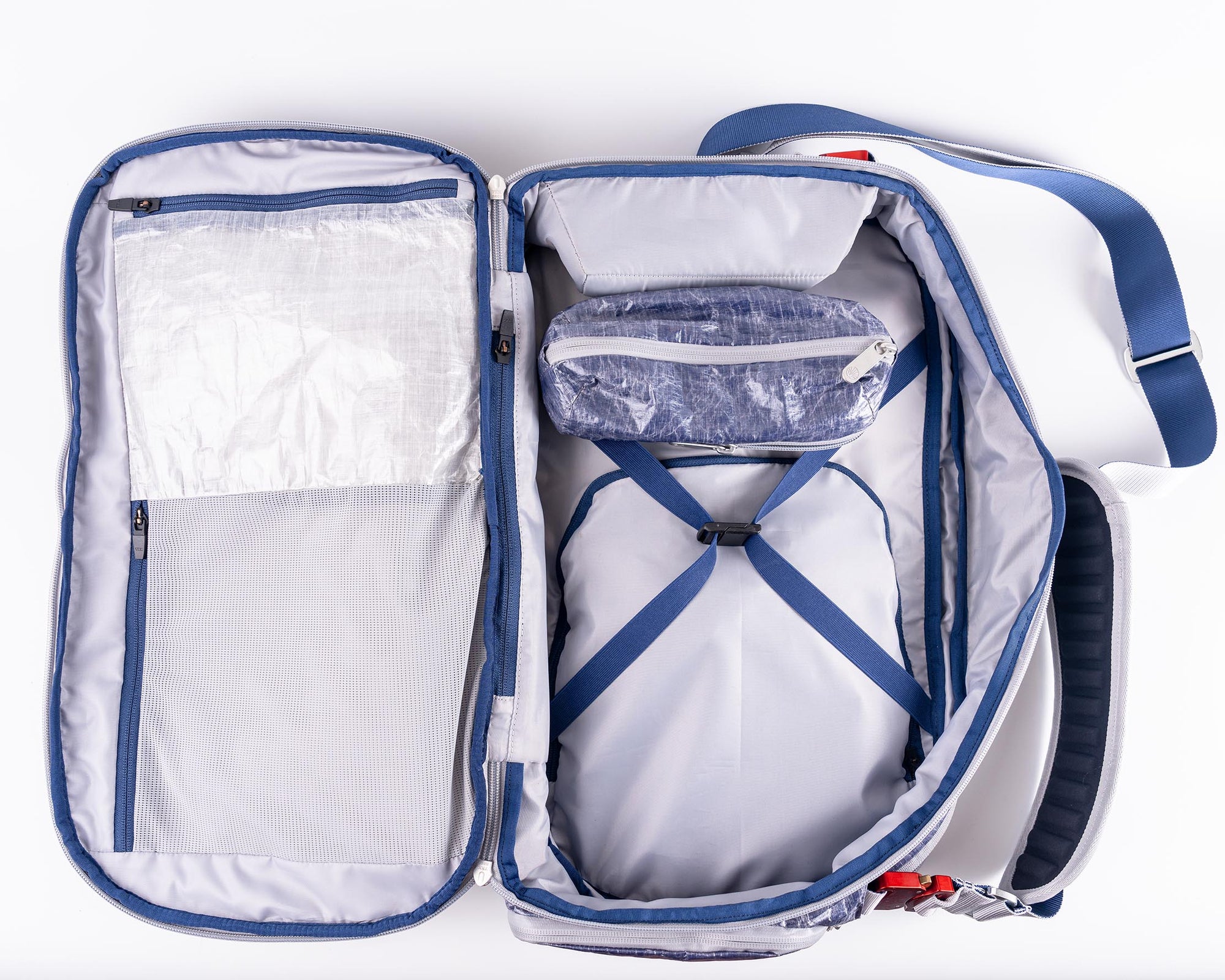 Open Work-to-Water travel backpack with blue accents on a white background