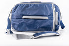 Rear view of the Offsite Work-to-Water Bag in Ocean blue, featuring Dyneema fabric, rear luggage pass-through, and adjustable padded shoulder strap