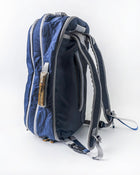 Offsite Work-to-Water Bag in Ocean blue Dyneema shown in backpack mode, featuring padded shoulder straps and signature wood-inlay aluminum handle